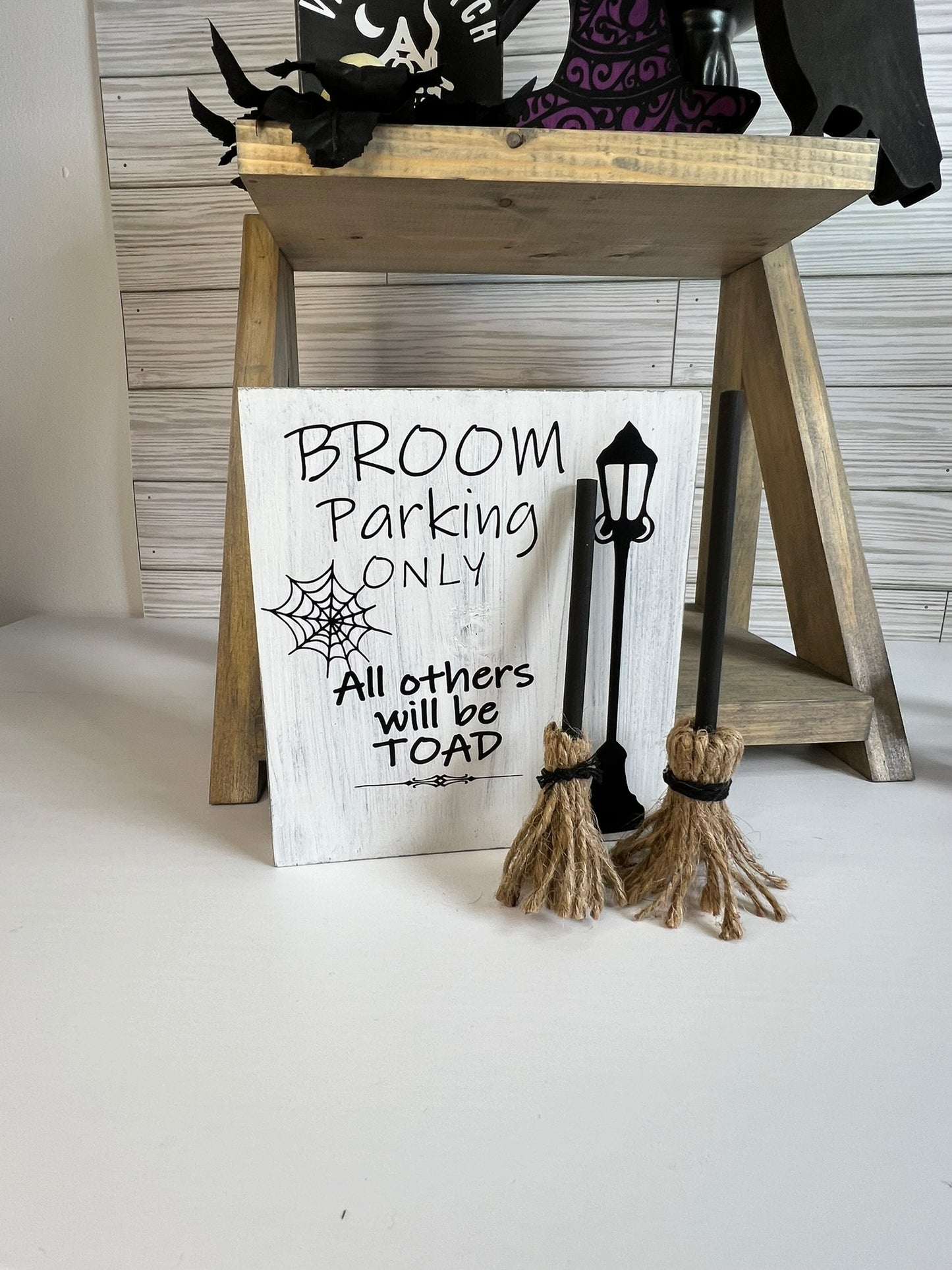 Broom Parking Only Sign