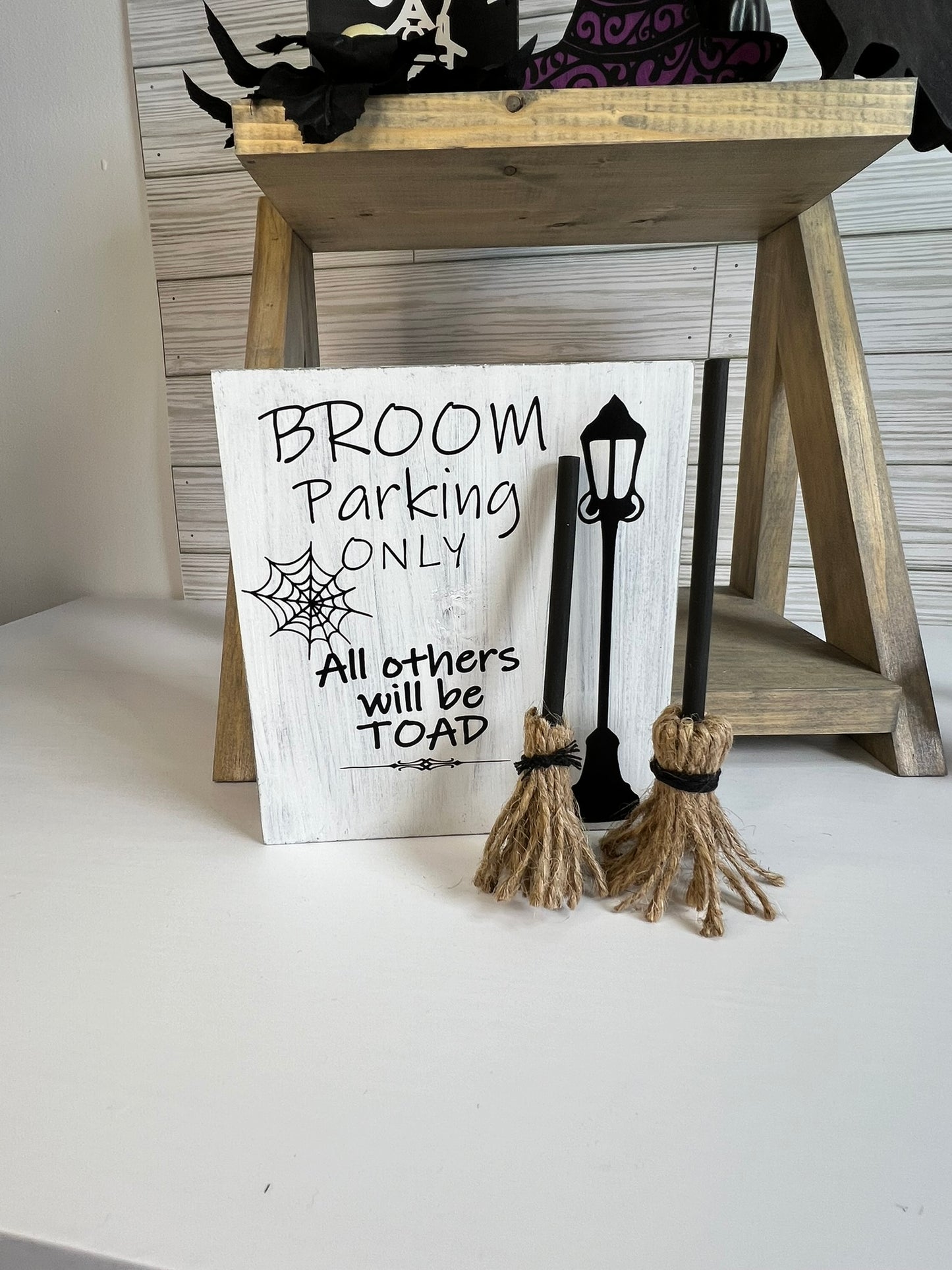 Broom Parking Only Sign