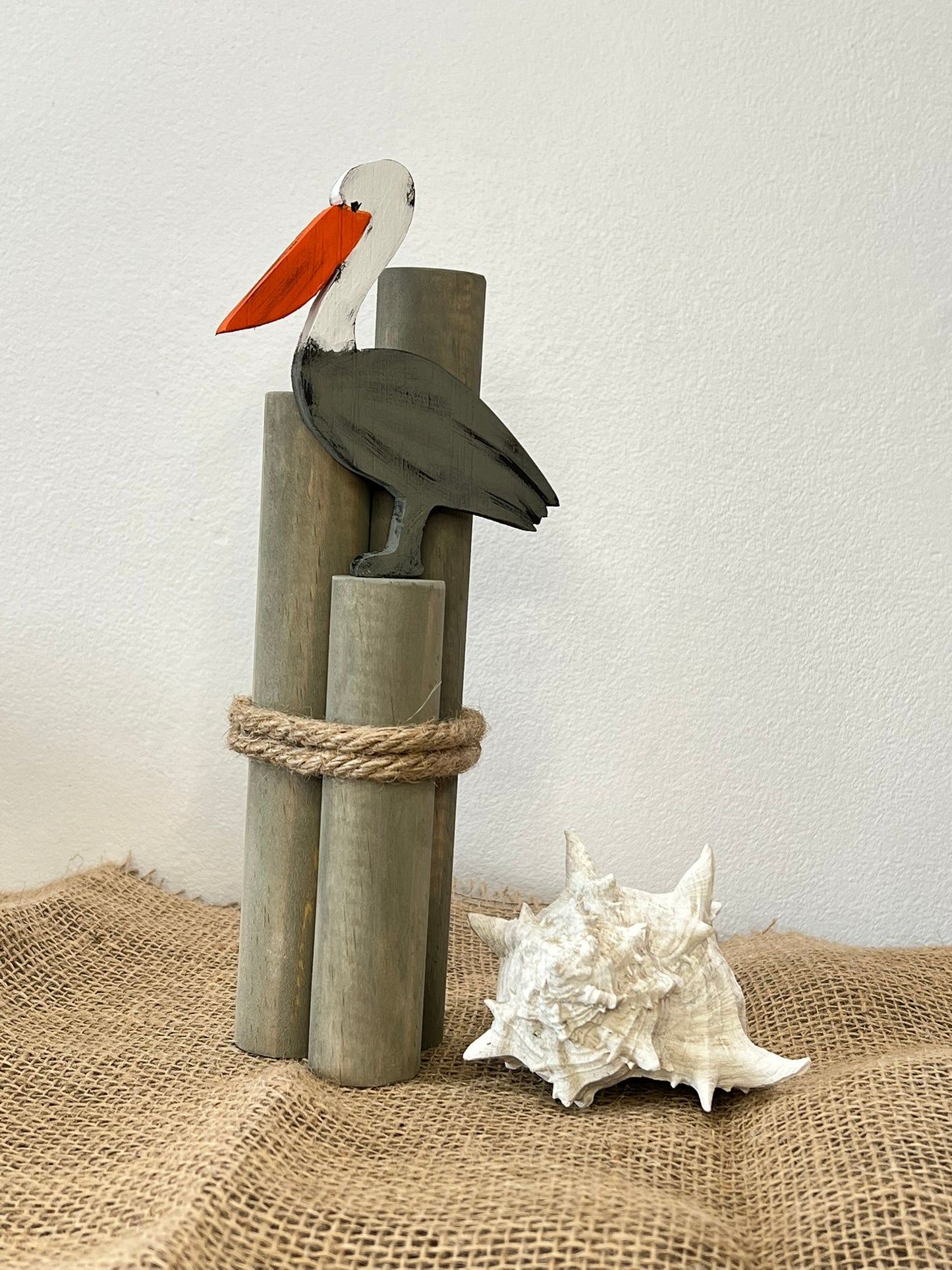 Beach Pilings with Pelican: Coastal Shelf Decor