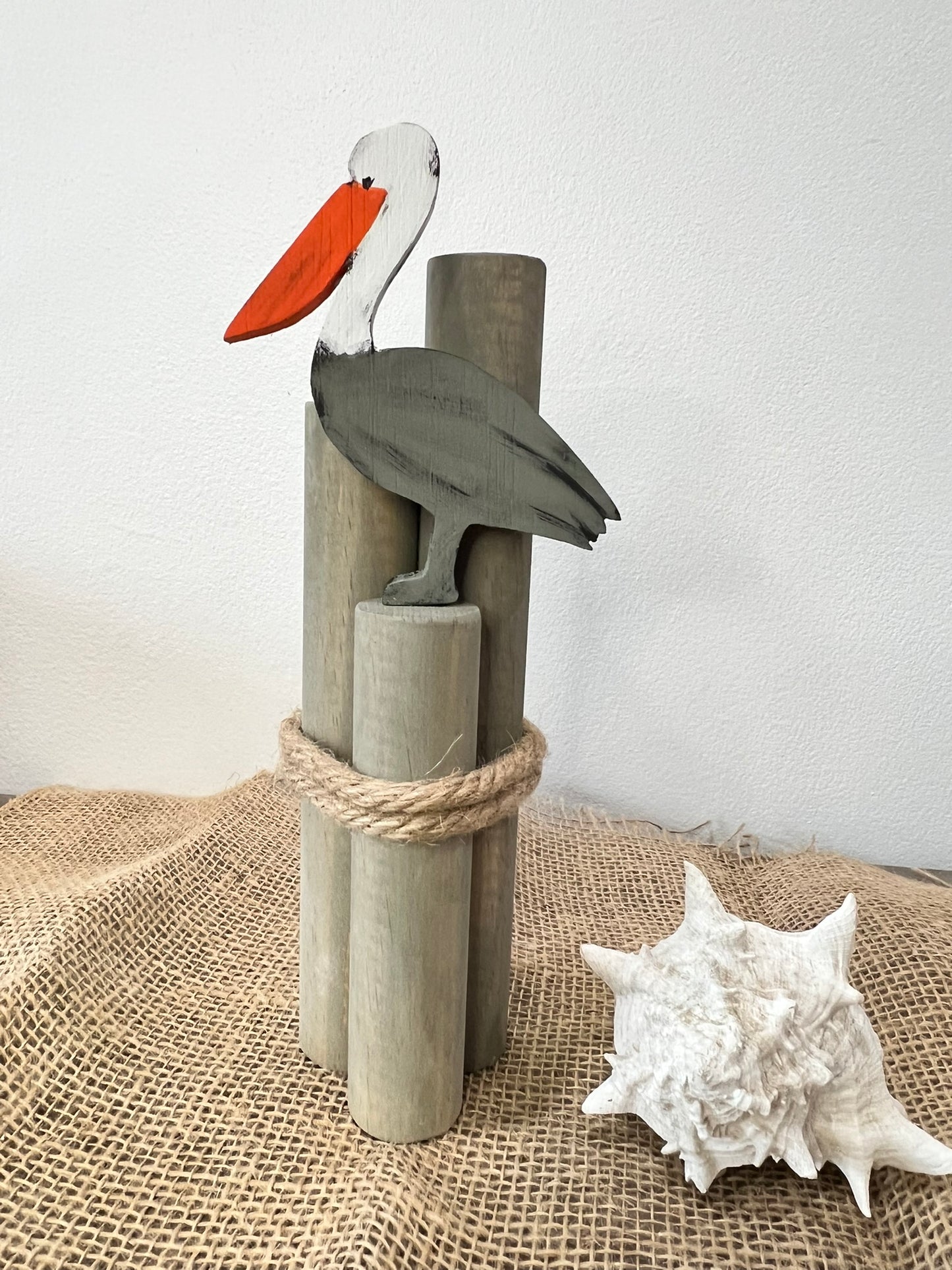 Beach Pilings with Pelican: Coastal Shelf Decor