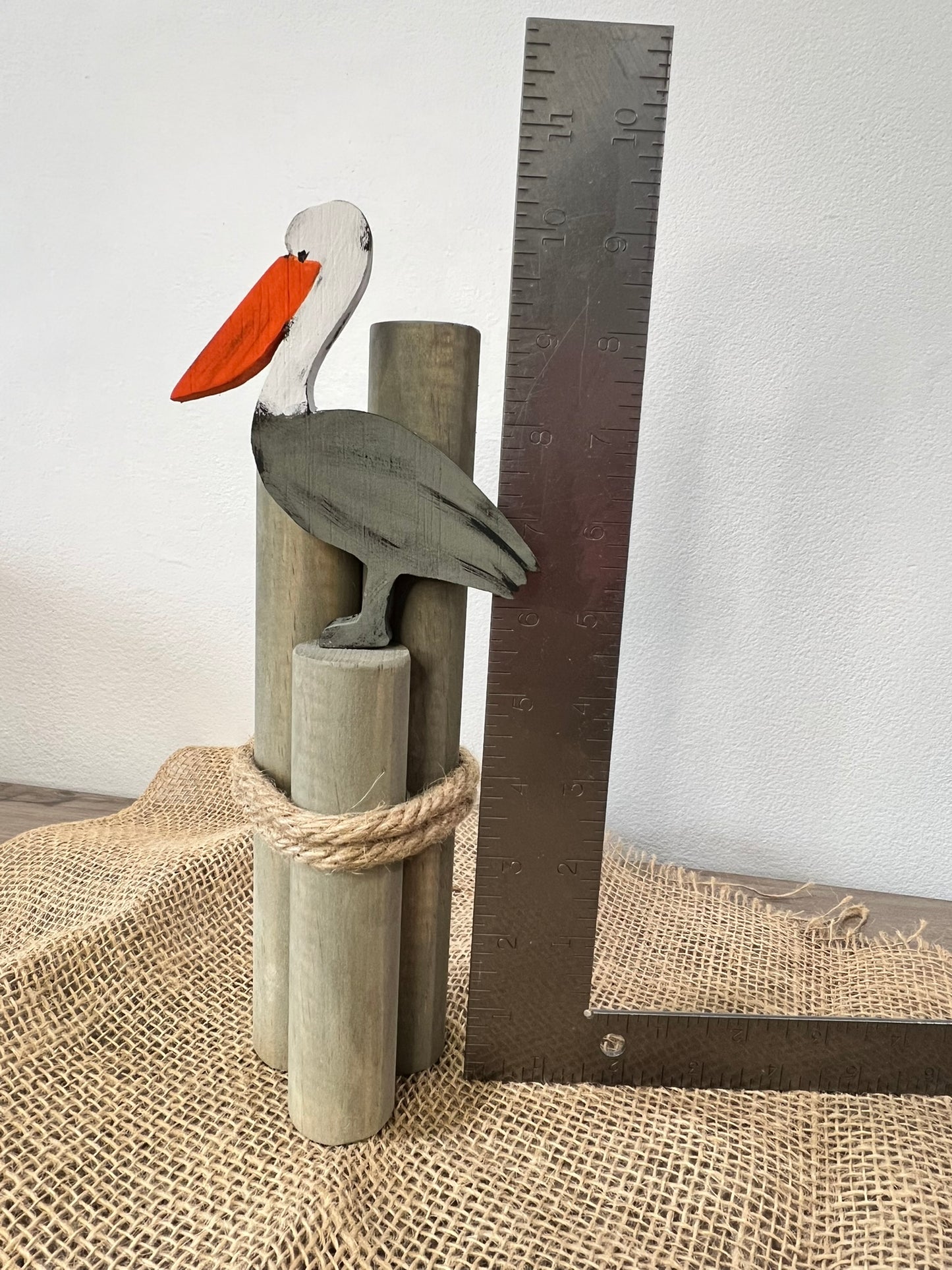 Beach Pilings with Pelican: Coastal Shelf Decor