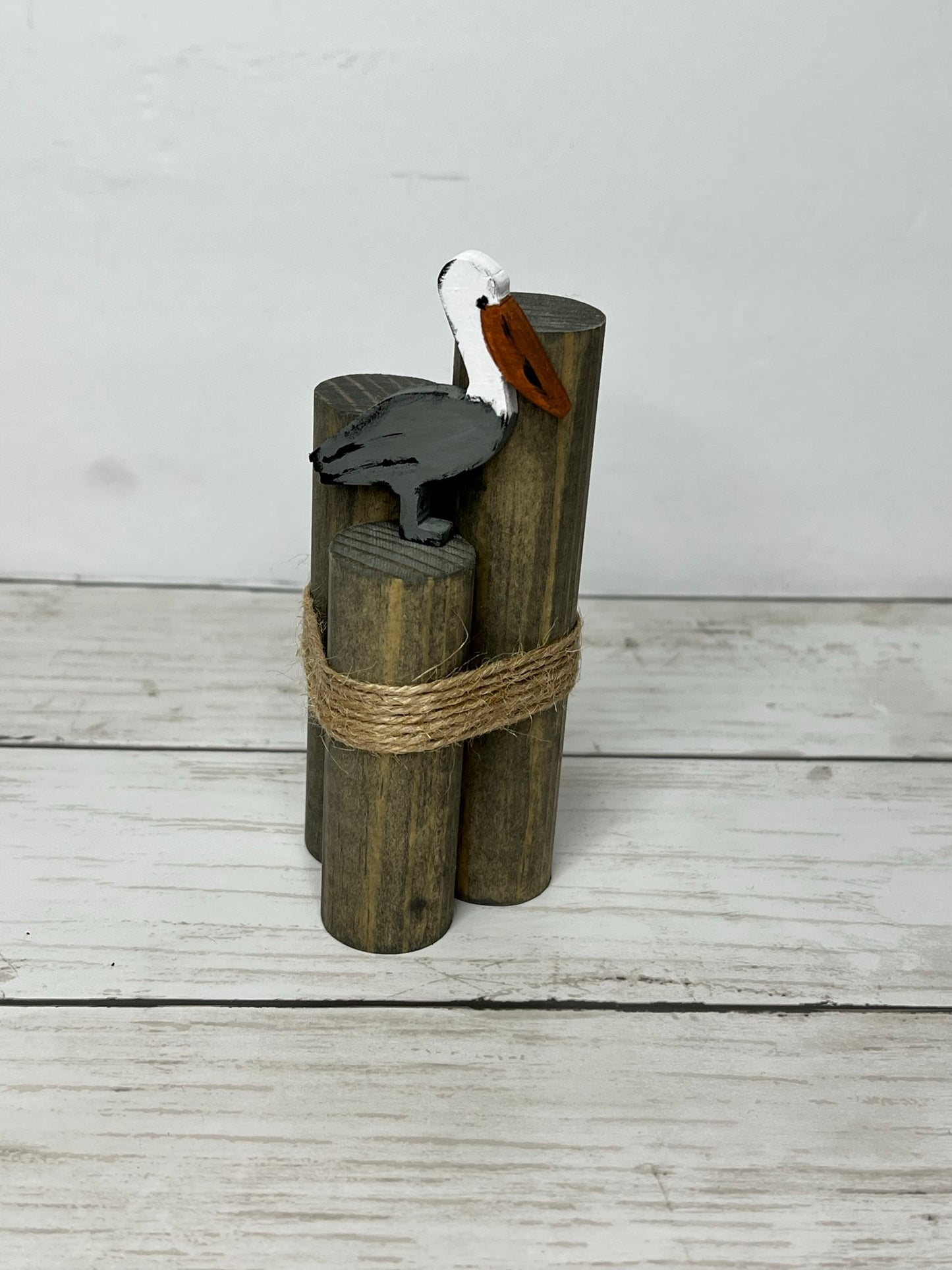 Mini Beach Pilings with Pelican