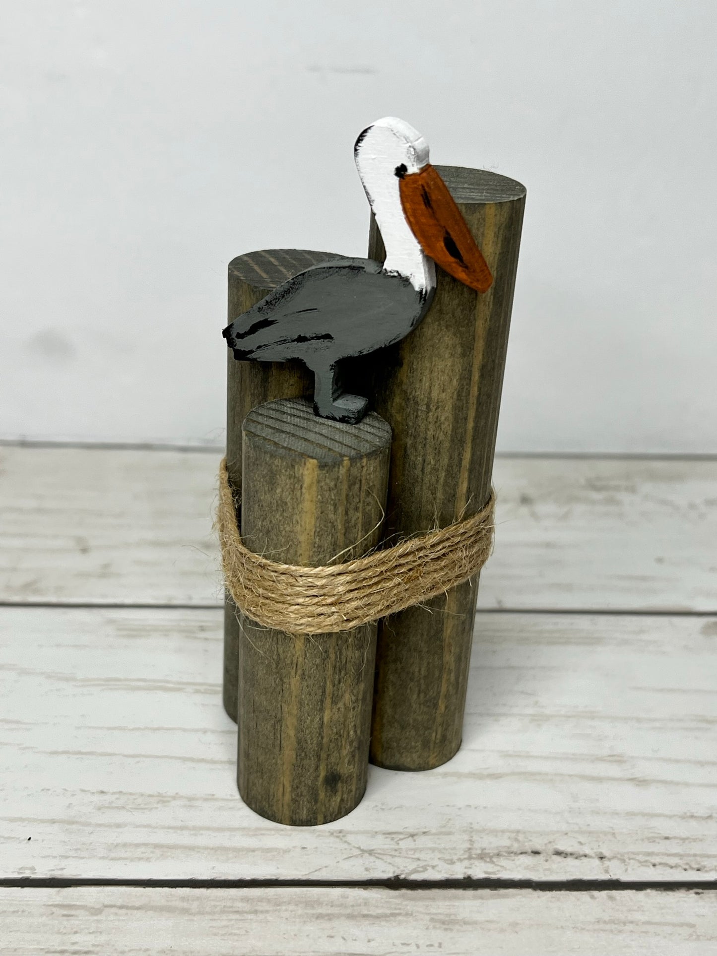 Mini Beach Pilings with Pelican
