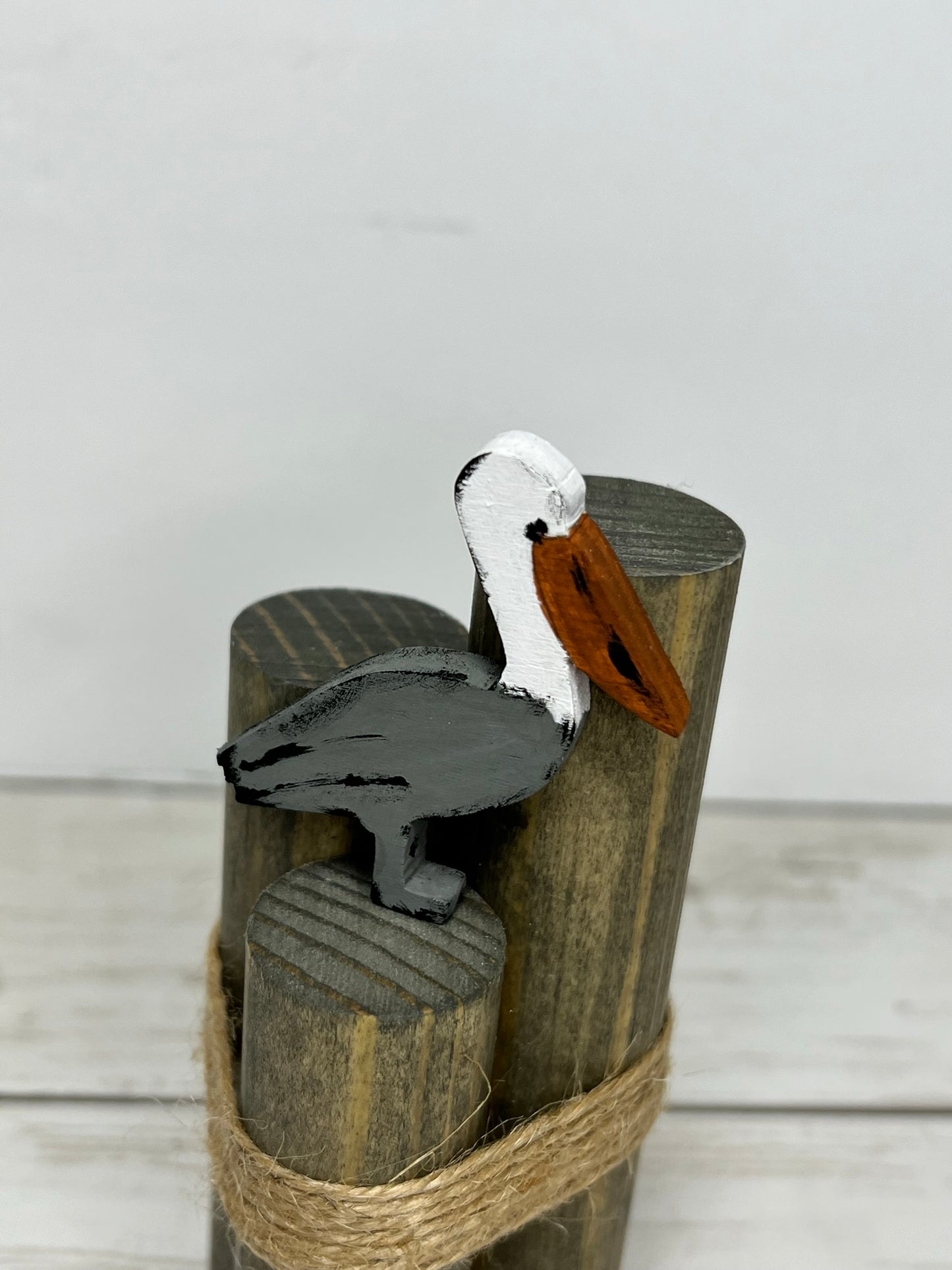Mini Beach Pilings with Pelican