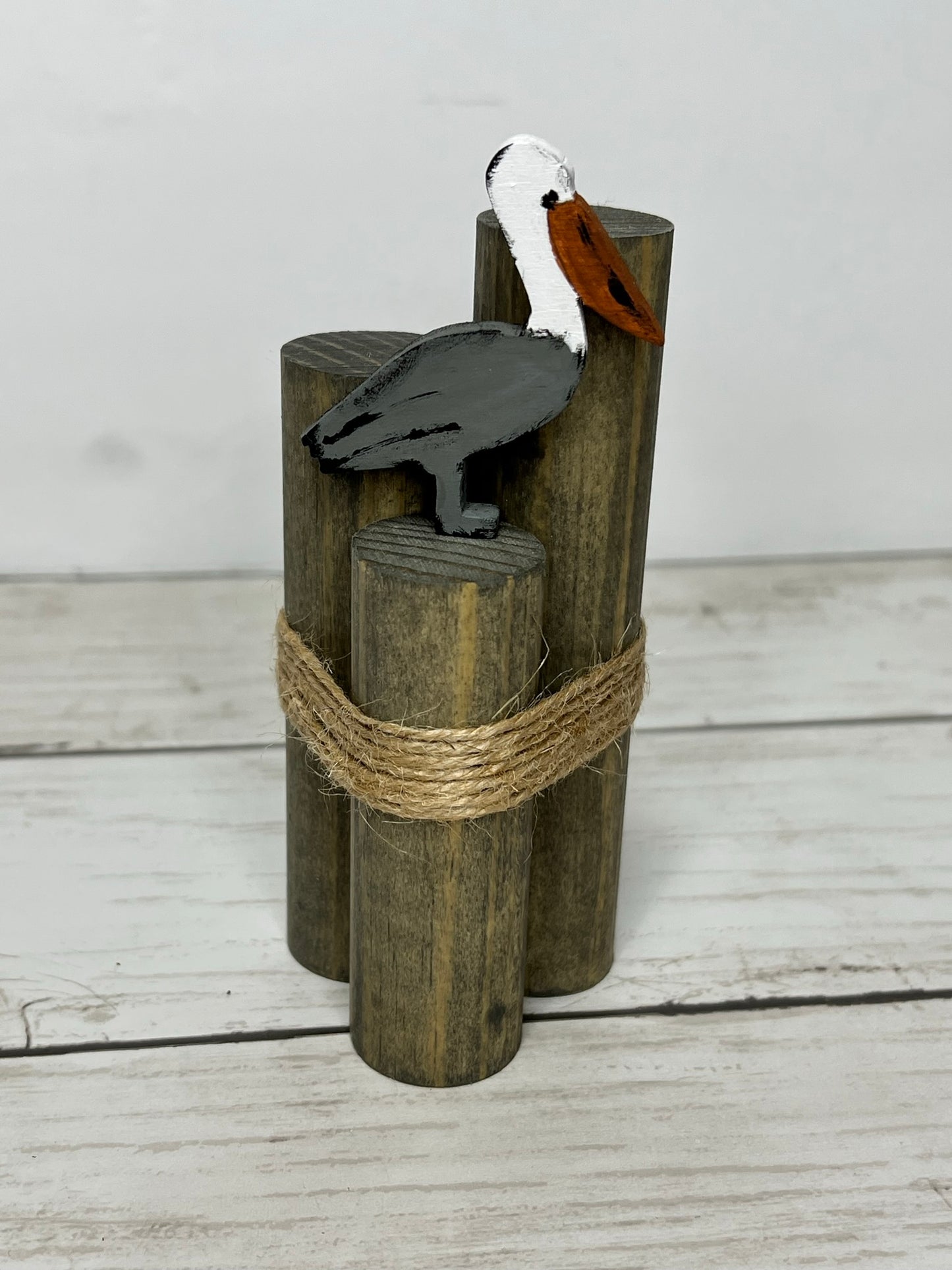 Mini Beach Pilings with Pelican