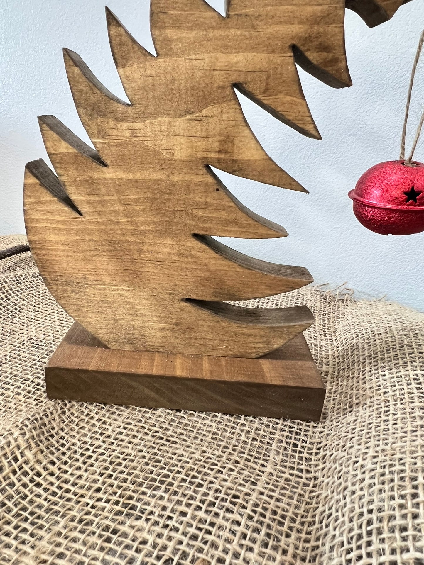 Leaning Farmhouse Style Christmas Tree with Hanging Bell